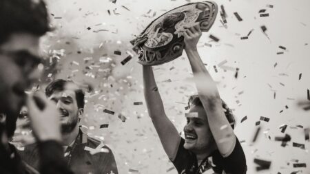 OG's JerAx lifting the Aegis of Champions after winning The International 2019 (TI9)