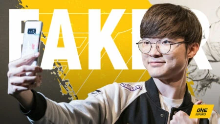 T1 Faker holding a phone to take a selfie