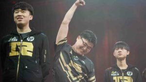 RNG Xiaohu, Uzi, and Ming at MSI 2018 with Uzi celebrating fist up