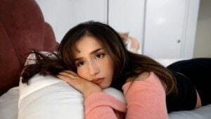 Pokimane lays down in thumbnail from YouTube video