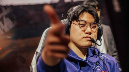 T1 Gumayusi doing a gun sign to the camera at MSI 2023 bracket stage day 2