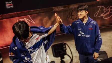 T1 Faker and Oner high five at MSI 2023 after their victory over MAD Lions