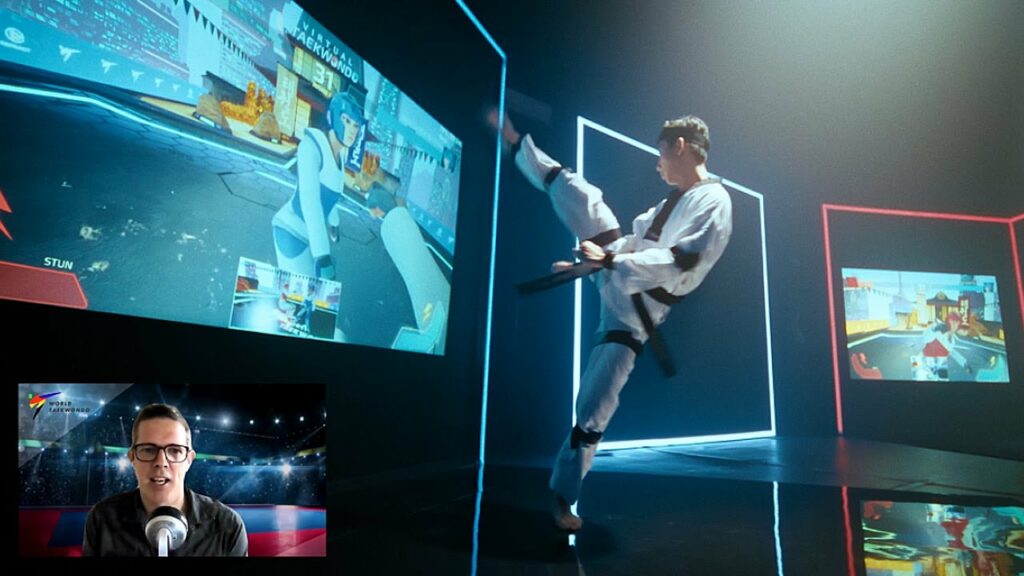 Keston Pang menendang dalam taekwondo virtual Retract Technologies