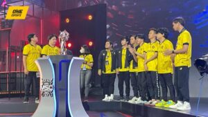 ONIC Esports celebrating their MSC 2023 championship victory on stage with the trophy after a 4-2 win over Blacklist International