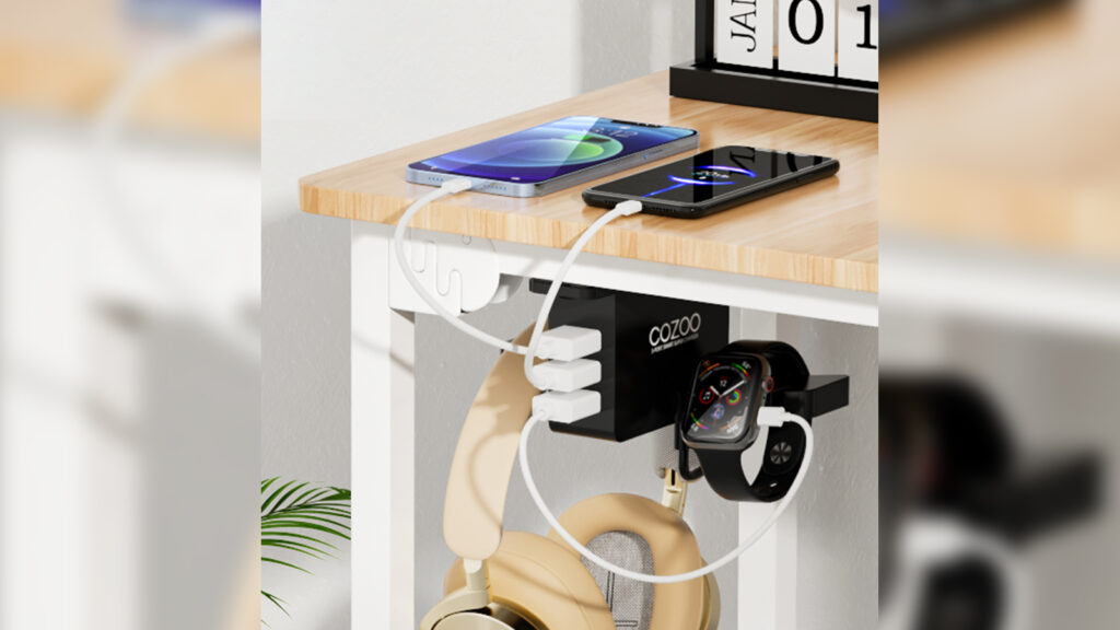Under-desk headphone stand with USB charging hub