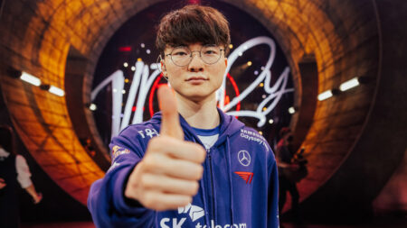 LONDON, ENGLAND - MAY 13: Lee "Faker" Sang-hyeok of T1 poses onstage after his victory against Gen.G Esports at the League of Legends - Mid-Season Invitational Bracket Stage on May 13 2023 in London, England.