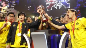 ONIC Esports lift the championship trophy after winning the MLBB Southeast Asia Cup 2023 on June 18 at the Aeon Mall Mean Chey in Phnom Penh, Cambodia.
