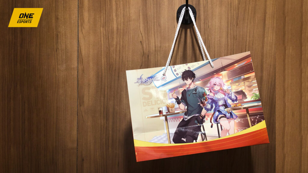 Honkai Star Rail Time to Feast: Astral Express Pit Stop merchandise and paperbag