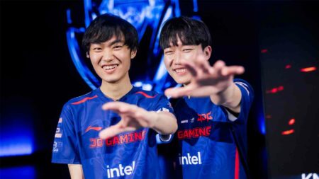 Zhuo "knight" Ding (L) and Lou "MISSING" Yunfeng of JD Gaming pose at the League of Legends World Championship 2023 Knockout Stage on November 4, 2023 in Busan, South Korea