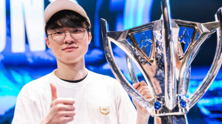 Lee "Faker" Sang-hyeok of T1 poses with trophy onstage after victory at League of Legends World Championship 2023 Finals at Gocheok Sky Dome on November 19, 2023 in Seoul, South Korea.
