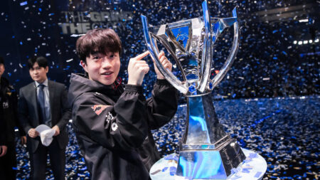 Ryu "Keria" Min-seok of T1 poses with trophy onstage after victory at League of Legends World Championship 2023 Finals at Gocheok Sky Dome on November 19, 2023 in Seoul, South Korea.