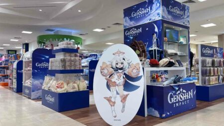 Genshin Impact store at Takashimaya Department Store showing Paimon standee and official products