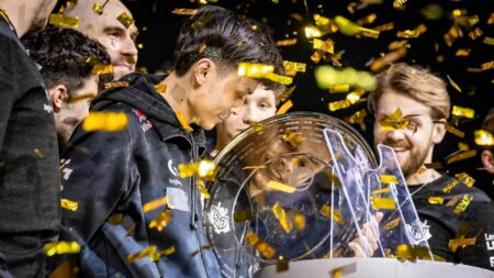Jacky "Stewie2K" Yip holds the trophy while celebrating with G2 Esports after winning IEM Dallas 2024