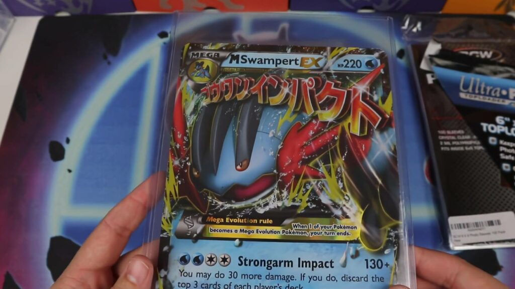 Tarjeta Pokémon grande MSwampert EX en un cargador superior