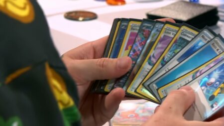 Various Pokemon cards at hand