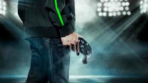 Man holding Razer Wolverine V3 Pro in right hand