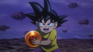 Dragon Ball Daima main character Goku holding a Dragon Ball from the Third Demon World