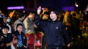 TFT player “TITLE” makes an entrance at the TFT Macao Open 2024 at the Venetian in Macao on December 15, 2024