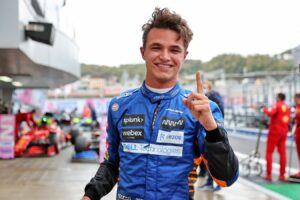 Lando Norris in a blue McLaren unfiorm on race day