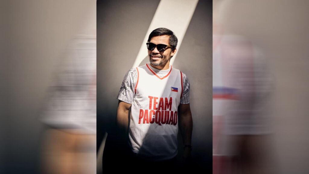 Manny Pacquiao posing with Team Pacquiao GG jersey on launch day