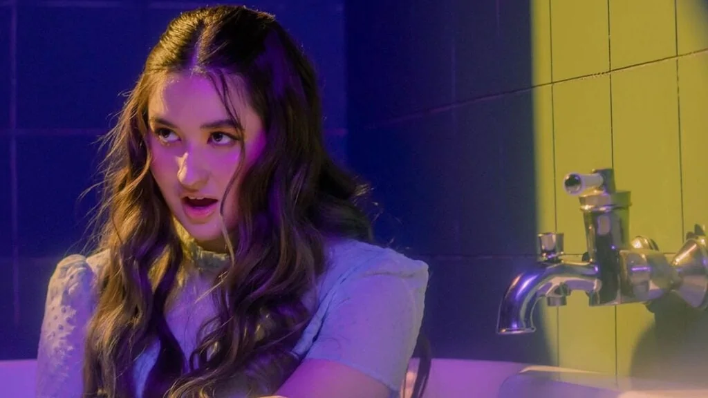 Stephanie Poetri in the Paranoia music video