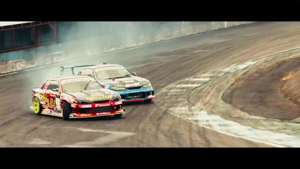 Screenshot of Alive Drift movie showing two drift cars on the race track