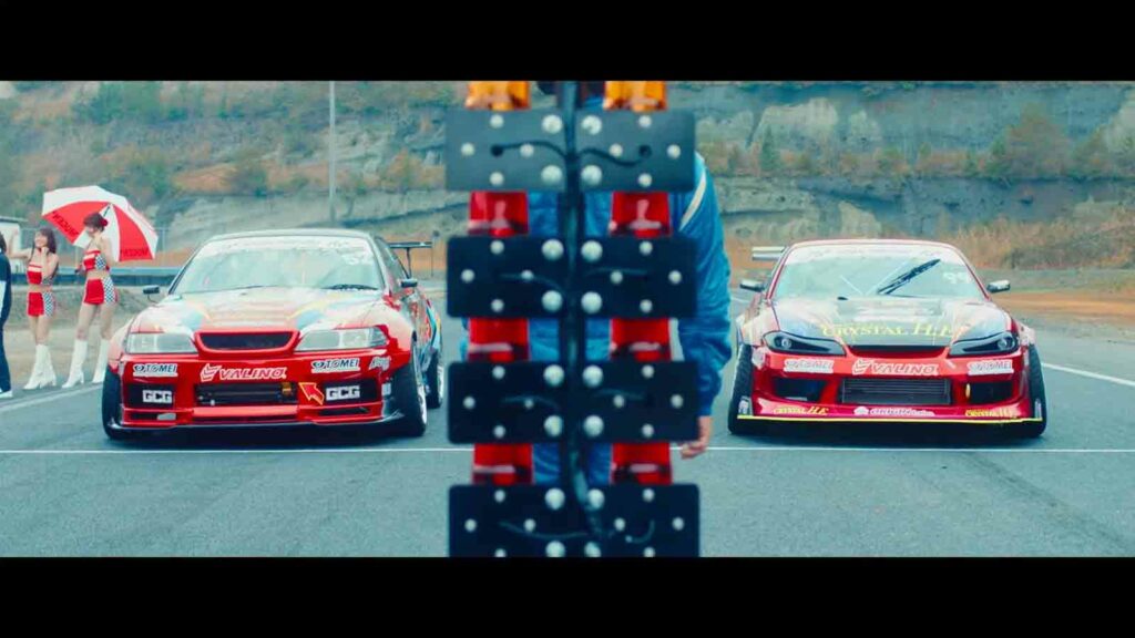 Screenshot of Alive Drift movie showing two drift cars at the starting line