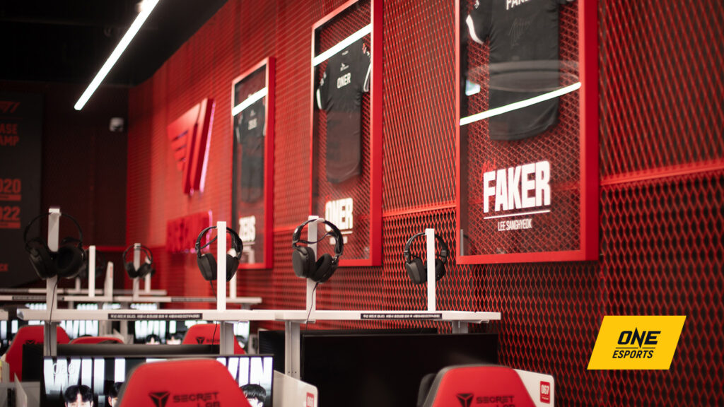 League Of Legends T1 Base Camp review and guide wall with jerseys