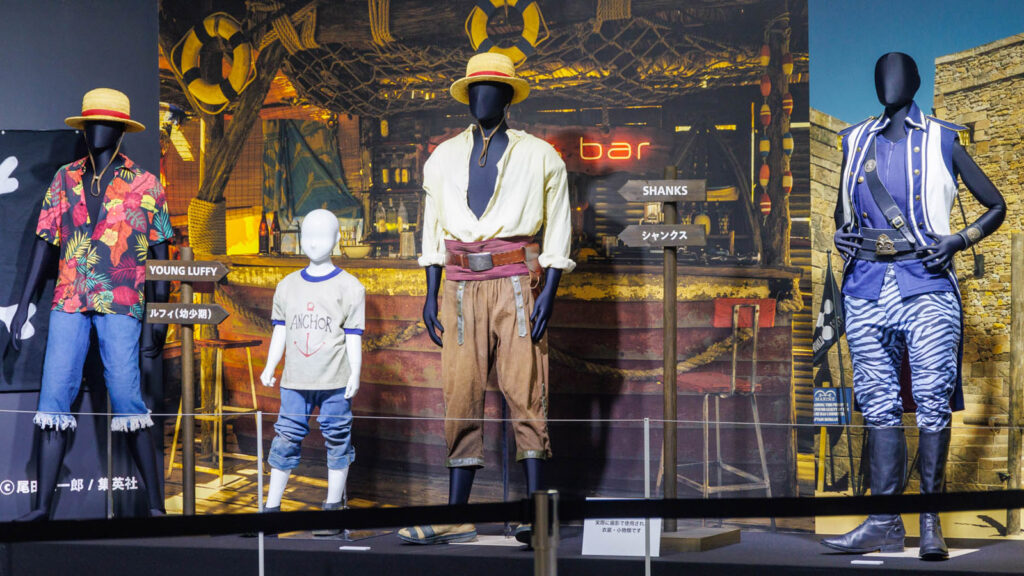 One Piece live action costumes during One Piece Day 2023 featuring Luffy, Young Luffy, Shanks, and Captain Morgan costumes