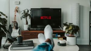 Person watching Netflix on Television