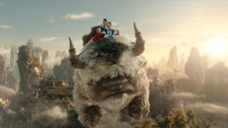 Aang, Katara, and Sokka riding Appa in the Avatar live action