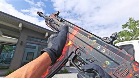 Inspecting an assault rifle with a Headed to Hell camo on Stash House in Modern Warfare 3