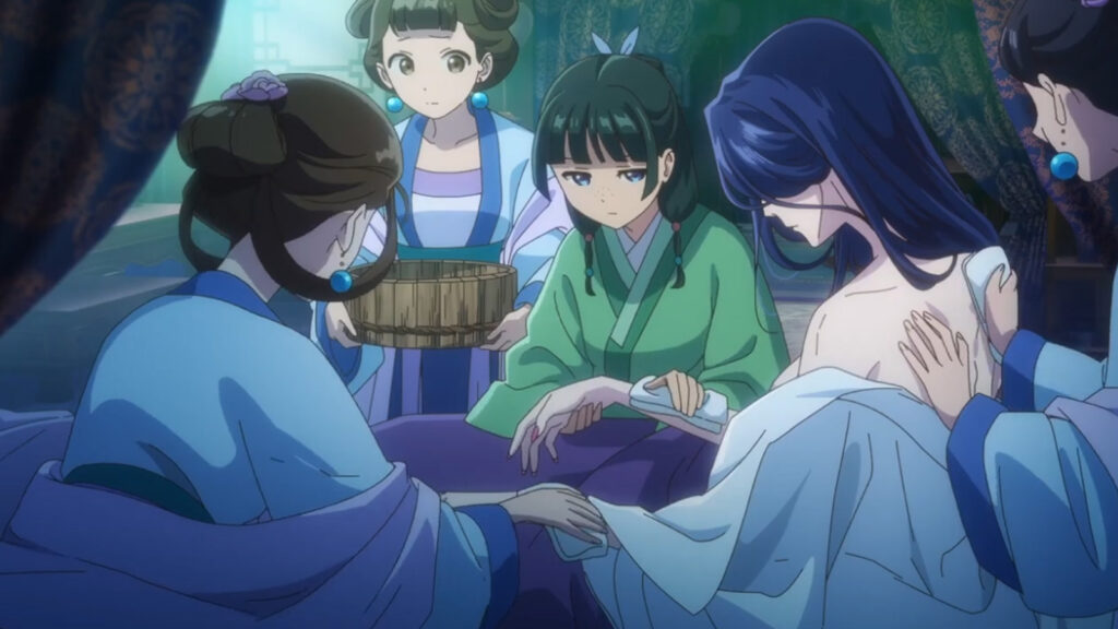 Maomao tending to concubine Lihua in Apothecary Diaries season 1